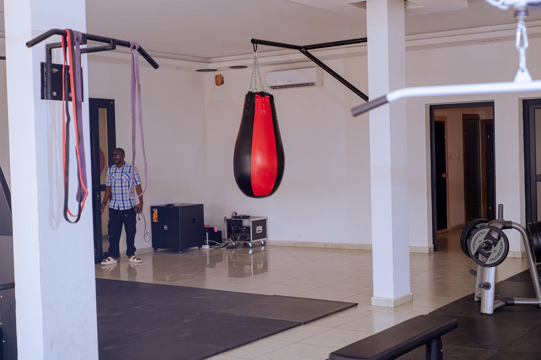 OBSIM fitness studio with weight machines and rooftop views